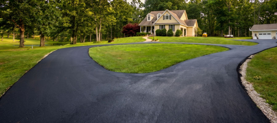 Completed asphalt circle turnaround at a residential property in Salem, Missouri