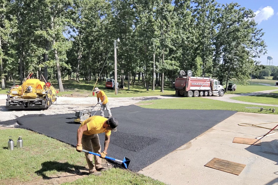 Residential asphalt paver installing the main driveway in Salem, Missouri