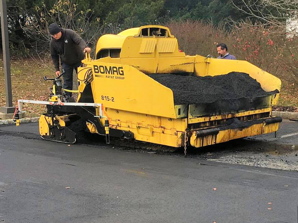 Titan's Specialized Paving Equipment with Automated Grade Control